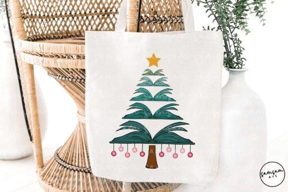 Christmas Tree PNG Designs for Sublimation featuring a tree made of open book pages with a star on top and hanging ornaments