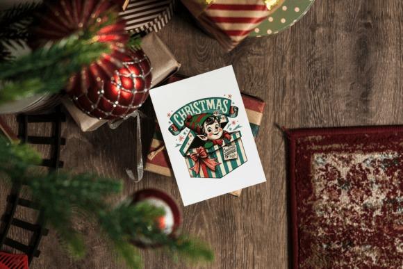Christmas elf clipart designs on a holiday card with a festive elf popping out of a gift box
