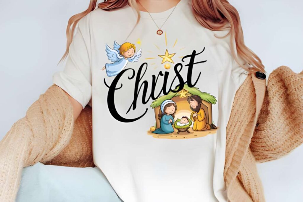 Christmas t-shirt design ideas for POD sellers featuring a nativity scene with Mary, Joseph, baby Jesus, an angel, and the