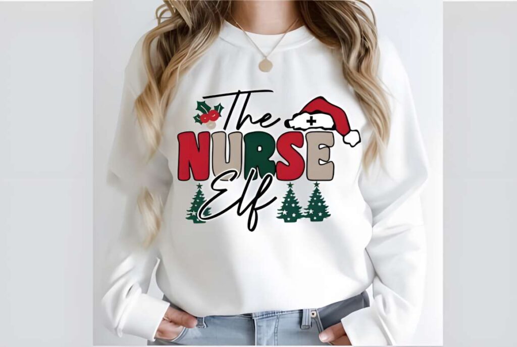Christmas T-shirt design ideas for POD sellers featuring a white sweatshirt with The Nurse Elf text and holiday graphics